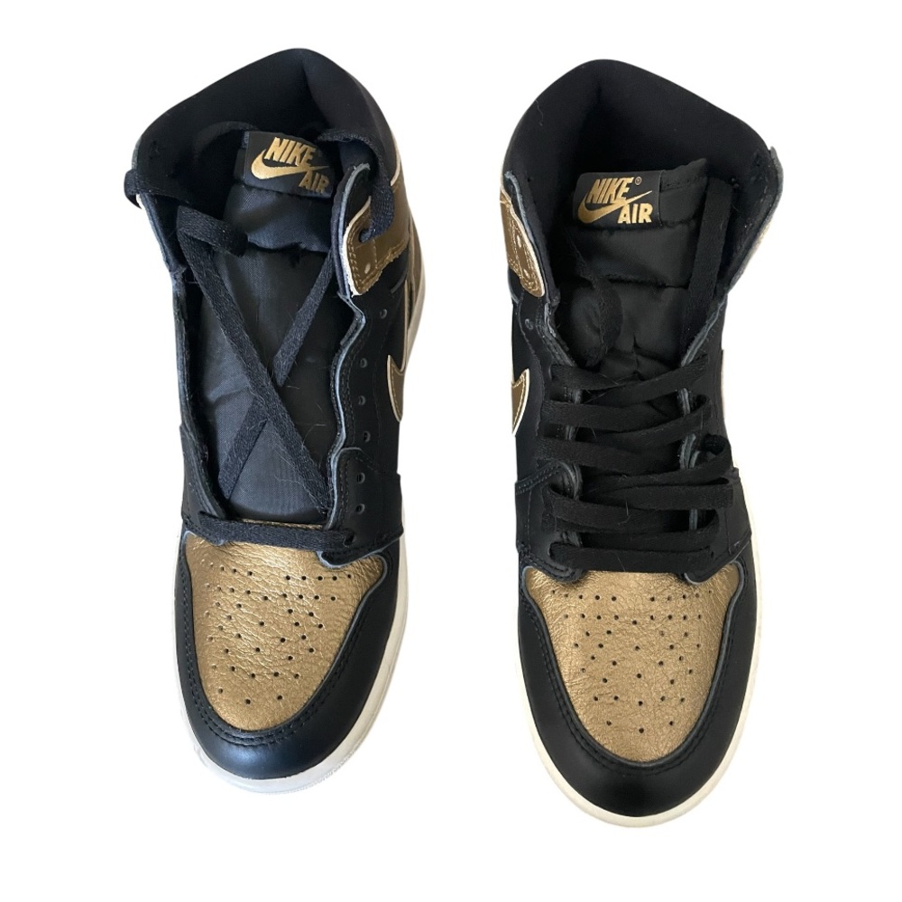 Nike Air Jordan 1 Retro High OG in the "Black Metallic Gold" colorway Sneakers
